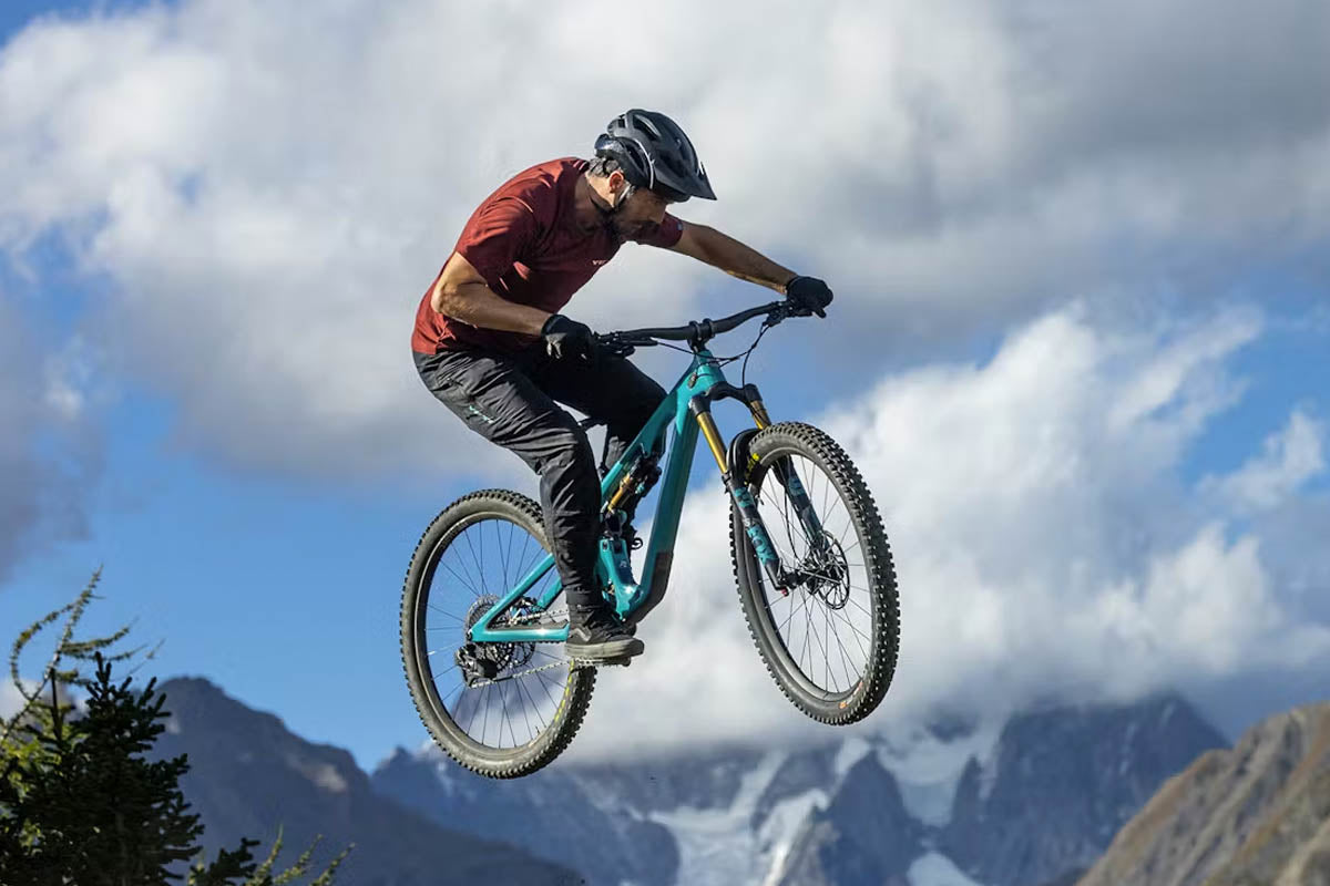 Rider Standing Up on a Yeti SB140 Bike