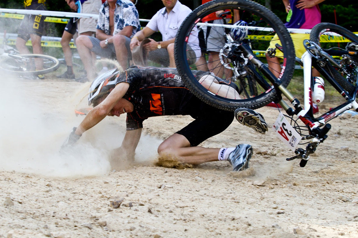 Man Falling Off a Bike