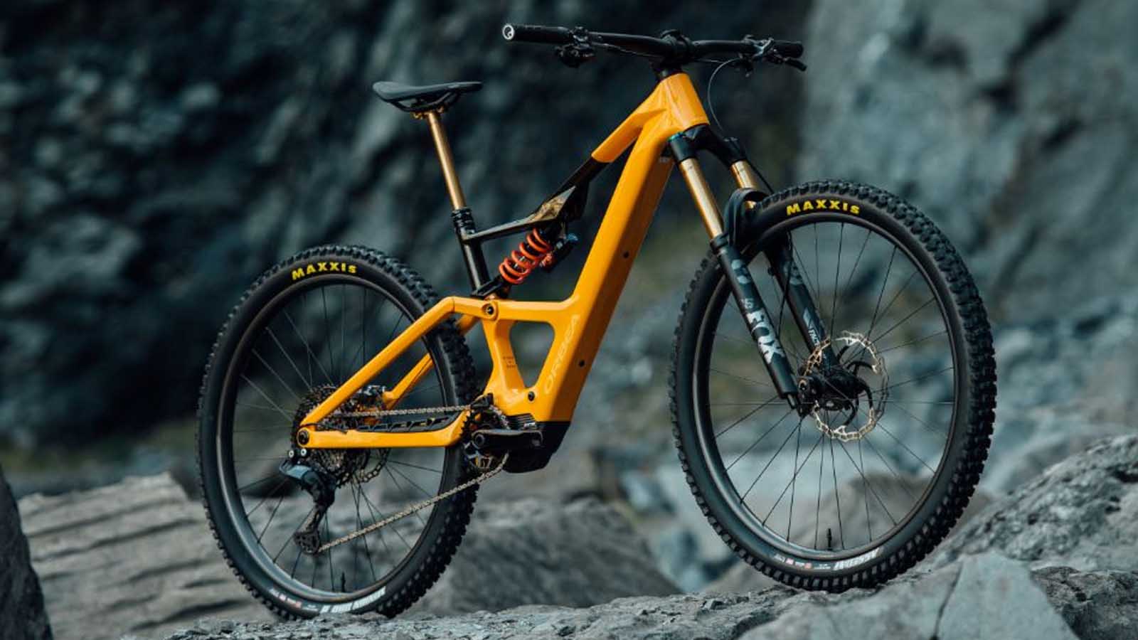 Bright orange bike in a rocky landscape